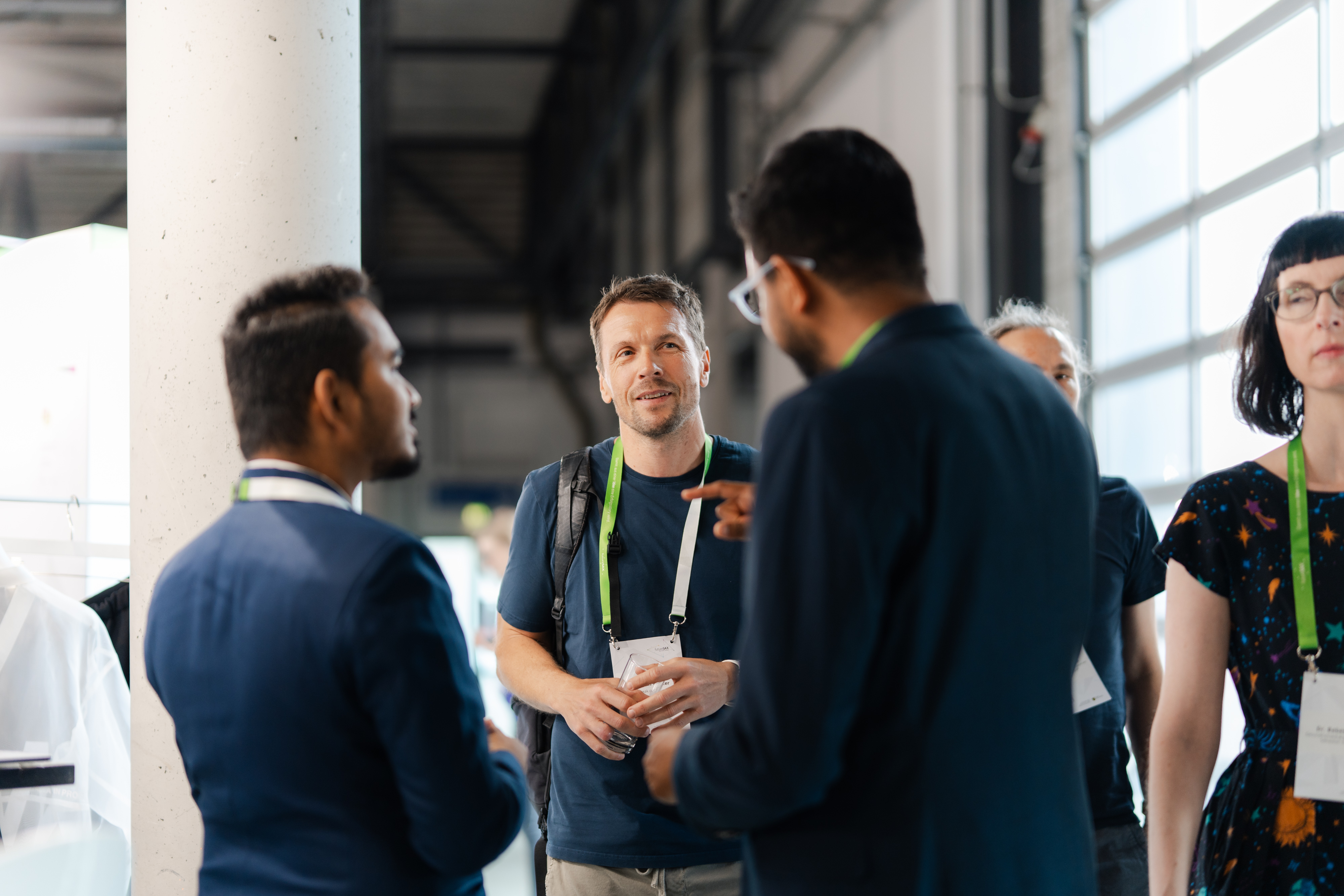 People in conversation at the #IK26